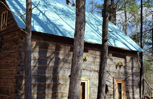 Huddleston Cabin | Unique Historical log cabin with private beach and 300 ft. of waterfrontage.