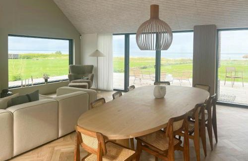 Vejlby Fed House | Unique Holiday Home Directly On The Beach