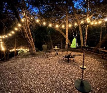 Rosston House | Unique Jungle-Style Glamping RV with 8-Foot Suspended Tree Tent near Creek Trails in Forestburg, Texas