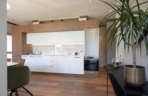 Travexin Apartment | Unique loft with mountain-view terrace, 2 bedrooms, sauna, garage – Beds made & cleaning included