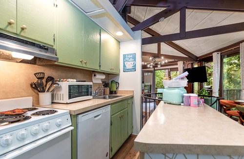 The Galena Territory Cabin | Unique octagon house in woods- Hot tub, pool, fireplace, firepit