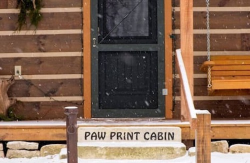Elmdale Cabin | Unique Paw Print Cabin nestled in the Flint Hills!