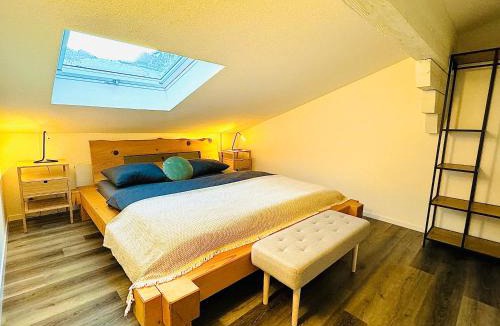 Blausee Apartment | Unique Penthouse with Gallery and Mountain View