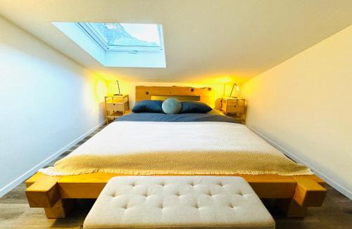 Blausee Apartment | Unique Penthouse with Gallery and Mountain View