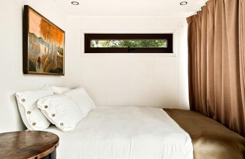 Taos House | Unique Tiny House Space Cabin with Rooftop Patio and 360° Mountain Views near Taos, New Mexico