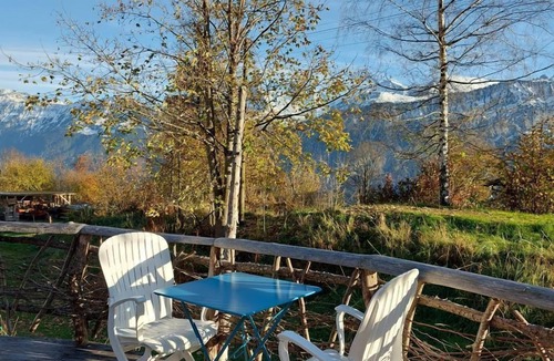 Sundlauenen Ski Chalet | Unique wooden hut with mountain panorama