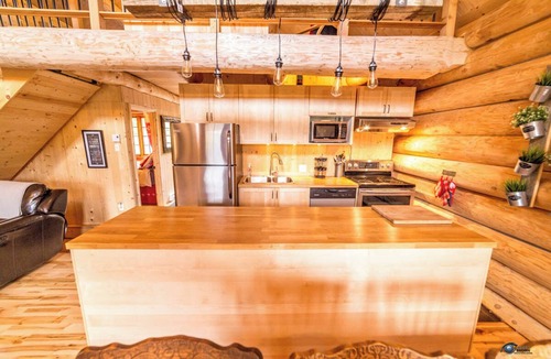 Mauricie Ski Chalet | Uniquely landscaped log cabin with spa!