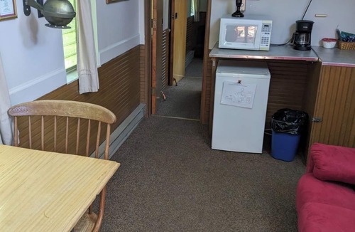 Orange Prairie Apartment | Uniquely Quaint Santa Fe Train Caboose 4