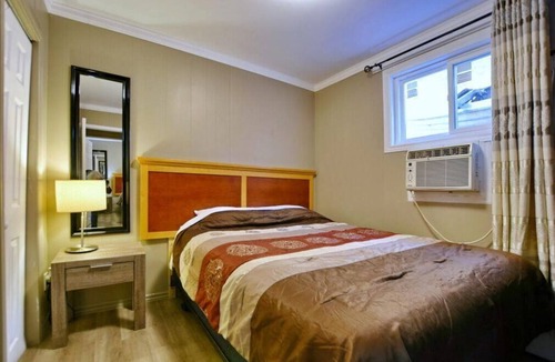 Wasaga Beach Cabin | Unit 3 Beach Escape 2BR Suite Steps to Sand BBQ Parking