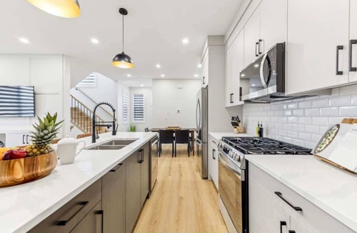 Southwest Calgary House | Up+Down Suites, 2 Kitchens, 3 King Beds, Garage