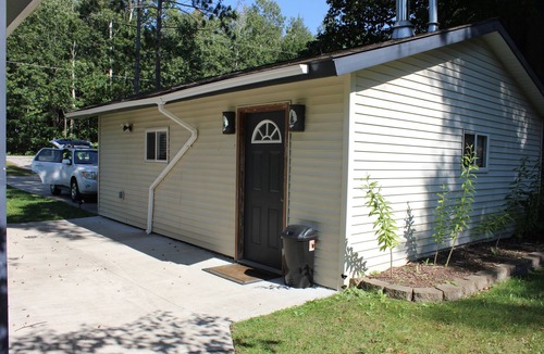 Hope Cottage | Up North Retreat - hot tub - pool table -arcade- sandy oasis- fire pits