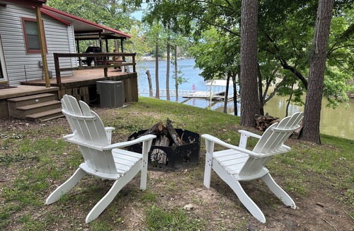 Jay House | Updated 3 bedroom lakefront home offers privacy and comfort w dock on Grand Lake