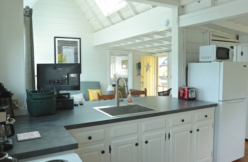 West Boothbay Harbor House | Updated Cottage on Water’s Edge with Deepwater Boat Dock!