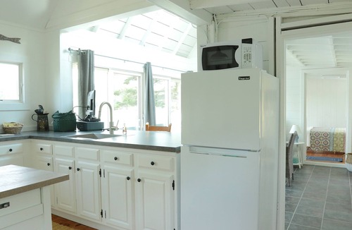 West Boothbay Harbor House | Updated Cottage on Water’s Edge with Deepwater Boat Dock!