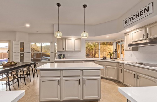 Foothills House | Updated & Spacious, Heated Pool, 5BR, 4 King Beds, Mt Views, Game Rm, Putting Gr