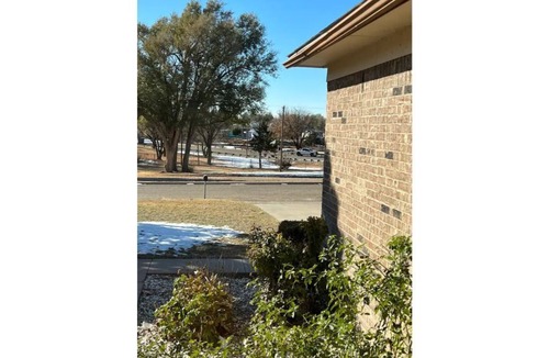 Guymon House | Updated three bedroom home across from park