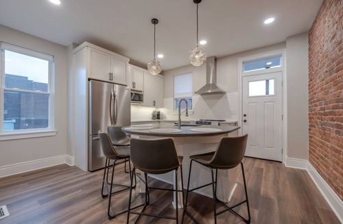 South Side Flats House | Updated Townhome with Private Garage in South Side