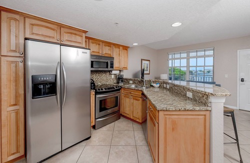 Clearwater Beach Condo | Updated Unit! Prime Location! Balcony, Waterfront Pool! FREE Activities! ~ 406 Dockside