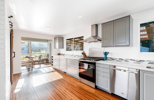 Oak Harbor House | Updated Water View Gem with Deck, BBQ/Outdoor Dining, Hot Tub, Fireplace, & WiFi