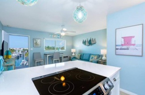 Marathon Apartment | Updated WATERFRONT, pool, tiki bar, boat ramp, etc