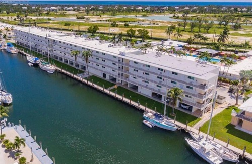Marathon Apartment | Updated WATERFRONT, pool, tiki bar, boat ramp, etc