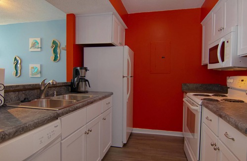 Oceanmarsh Subdivision Condo | Upgraded Condo Steps to the Boardwalk. Dog friendly!