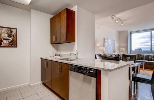 Hudson Exchange Apartment | Upscale 1BR | Full Kitchen | Washer-Dryer | by GLS