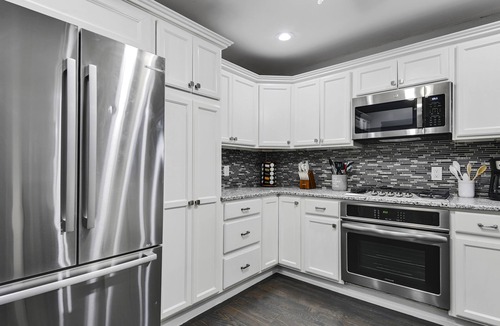 Overland Park House | Upscale 5BR Home w/Entertainer's Deck & Gated Driveway