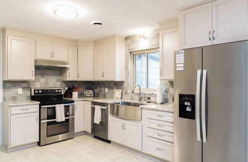 Oxford House | Upscale comfort & class with seasonal pool & yard
