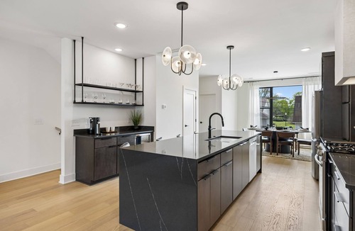 Hurwood Heights Condo | Upscale home featuring rooftop lounge with hottub!