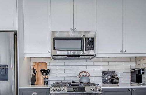 Kensington Condo | Upscale Industrial Condo with Patio near LRT