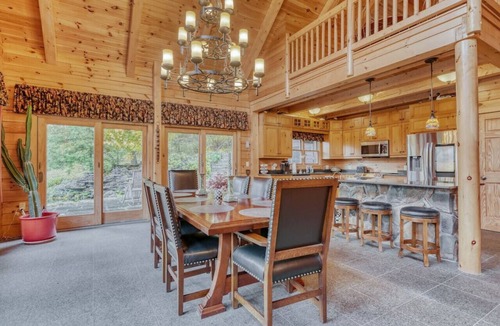 Perinton Cabin | Upscale log cabin w/20` ceilings, indoor hot tub & King beds