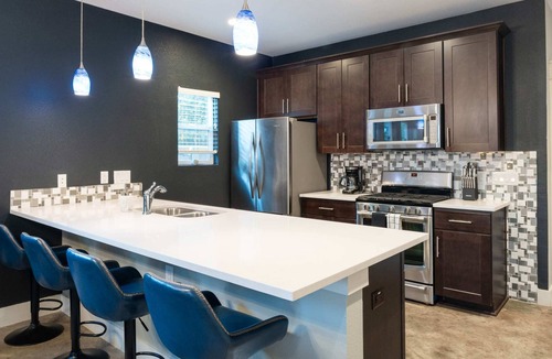 Govalle House | Upstay - Home w Yard Games, FirePit - Sleeps 18