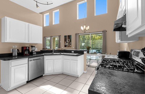 Crescent Lakes House | Upstay: Sunny Retreat with Pool, Patio & Hot Tub