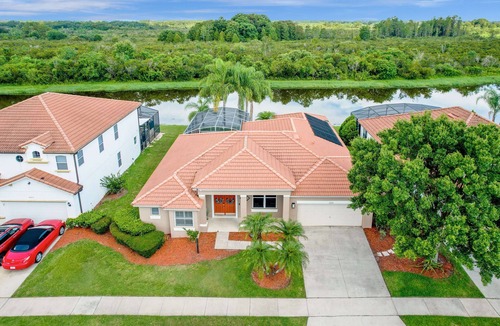 Buena Ventura Lakes House | Upstay - Waterside Home With Pool and Hot Tub