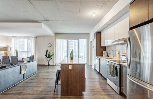 Laval Apartment | Urban 2BR Escape In-suite Laundry and Terrace