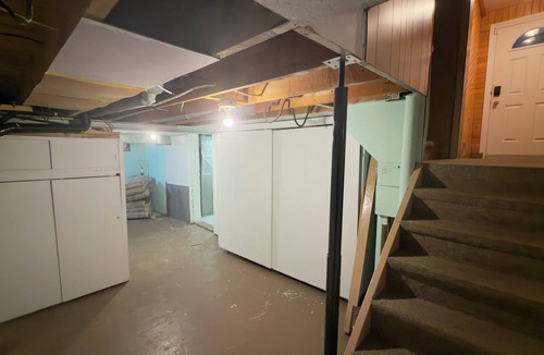 Fort Frances House | Urban Basement Retreat