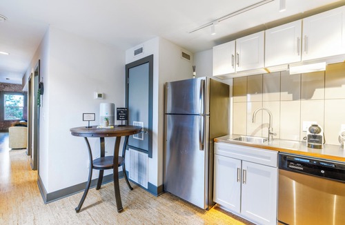 Rogers Apartment | Urban Brick Loft Studio Ride to Trails Walk to Dining, Shops & Nightlife