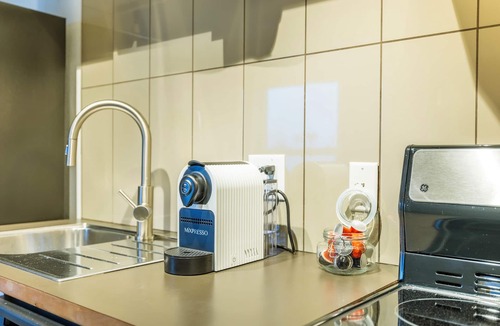 Rogers Apartment | Urban Brick Loft Studio Ride to Trails Walk to Dining, Shops & Nightlife