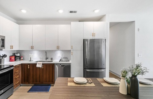 Forest Park Apartment | Urban Elegance: 3BR Condo Experience