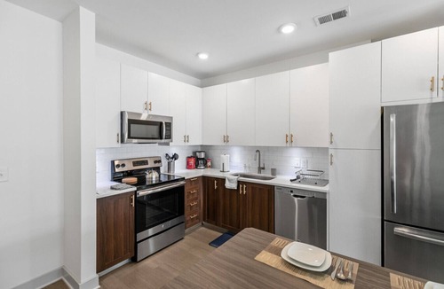 Forest Park Apartment | Urban Elegance: 3BR Condo Experience