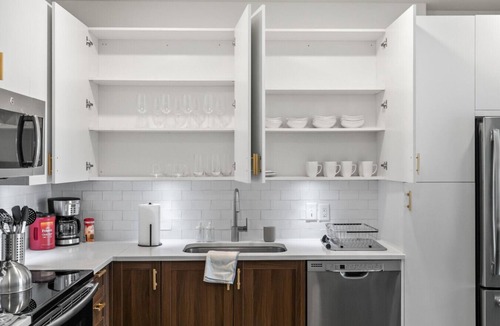 Forest Park Apartment | Urban Elegance: 3BR Condo Experience