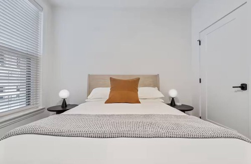 Main - Military Plaza Hotel | Urban Elegance—Steps from River Walk | In-Unit Laundry & Kitchen