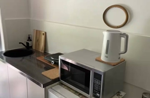 The Gap House | Urban Hideaway overlooking golf course.