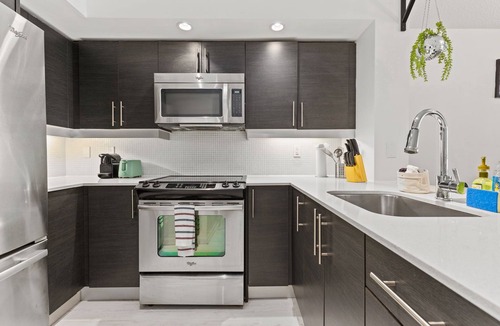 King West Village Condo | Urban Industrial Suite Perfect for Extended Stays