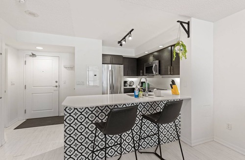 King West Village Condo | Urban Industrial Suite Perfect for Extended Stays