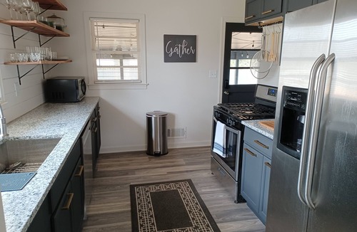 Smyrna House | Urban Ranch, at the Treasure House . 8 bed 3 bath 2 kitchen + basement suite