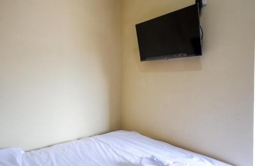 Pogung Lor Hotel | Urbanview Hotel Telu Wolu Monjali by RedDoorz