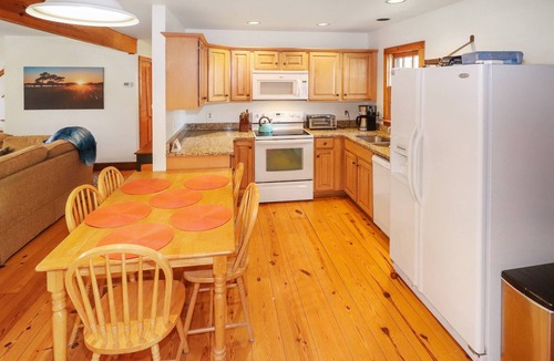 Chincoteague House | Utter East | 4BR Island Retreat, Huge Screened Porch, Decks + Fire Pit by Pond