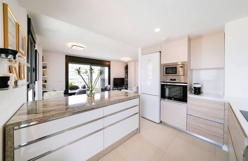 Cornella de Llobregat Apartment | Vacation Apartment "Sunsets & Pool in Barcelona" with Balcony, Shared Pool & Wi-Fi